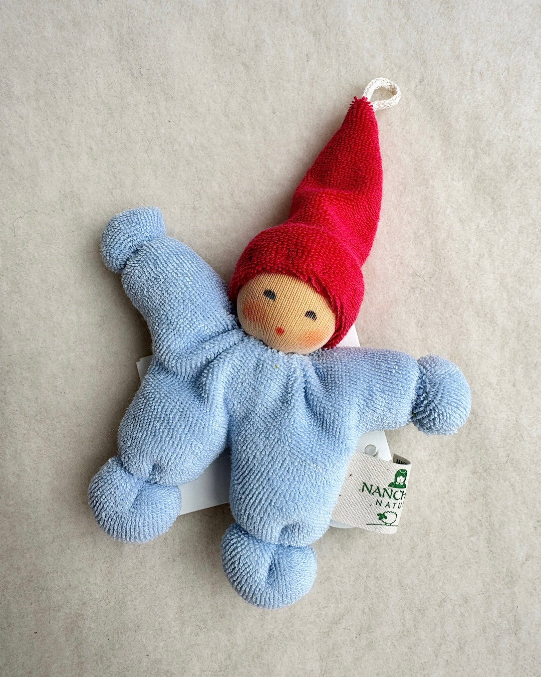 Håndsyet økologisk dukke blå