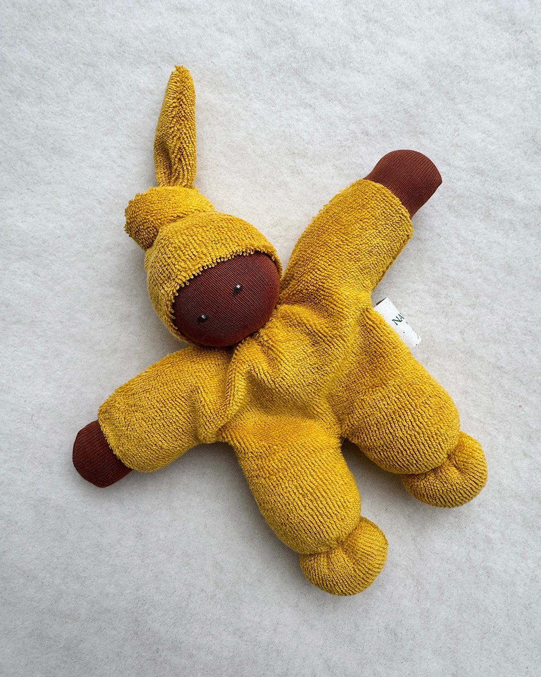 Hand-sewn organic doll orange