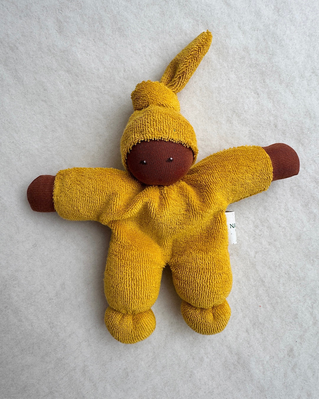 Hand-sewn organic doll orange