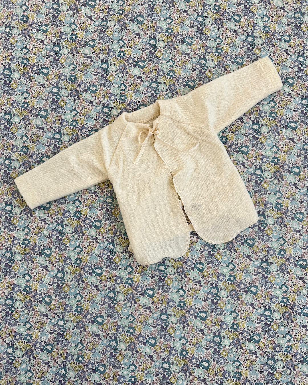 Cardigan in wool terry with ties for baby