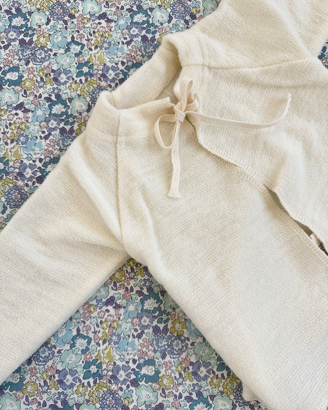 Cardigan in wool terry with ties for baby