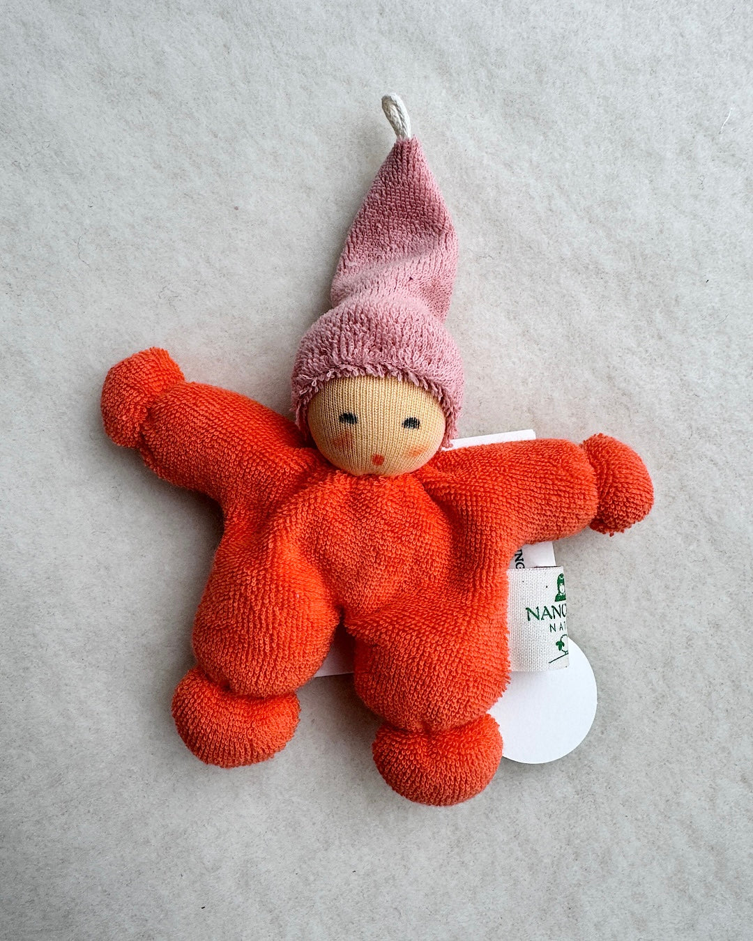 Hand-sewn organic doll orange
